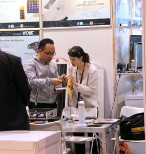 Schatz Center Senior Research Engineer Kristen Radecsky discusses technical points with a solar product designer.