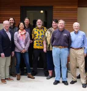 Advisory Board members stand outside the West Wing.