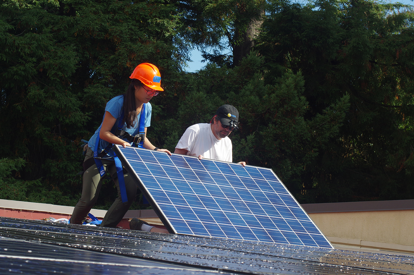 Ahn and Greg insert a module into its place