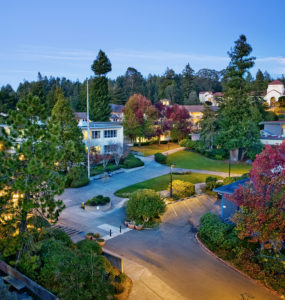 The HSU library, Siemens Hall and JVD courtyard is illuminated by nightlights, with Founders Hall in the distance
