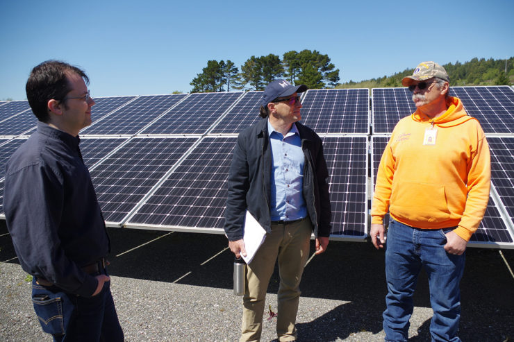 Two Schatz engineers and an electrician converse at the BLR array