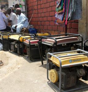 Backup generators line brick market walls