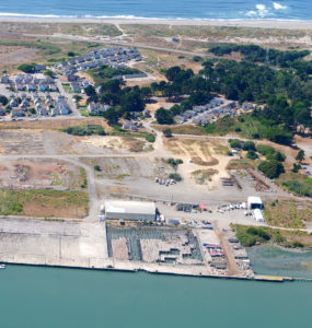 An aerial view shows a decaying dock at Redwood Marine Terminal 1