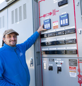 An engineer shows the microgrid control systems
