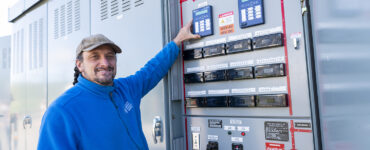 An engineer shows the microgrid control systems