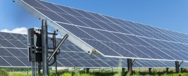 A solar array in a grassy field