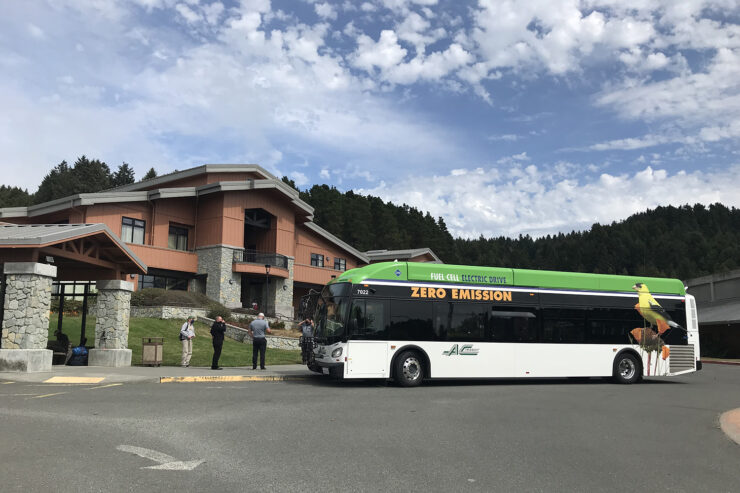 A hydrogen bus pulls up to College of the Redwoods